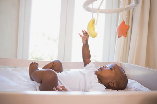 Creating a Safe and Stimulating Haven for Your Little One: Must-Have Baby Products